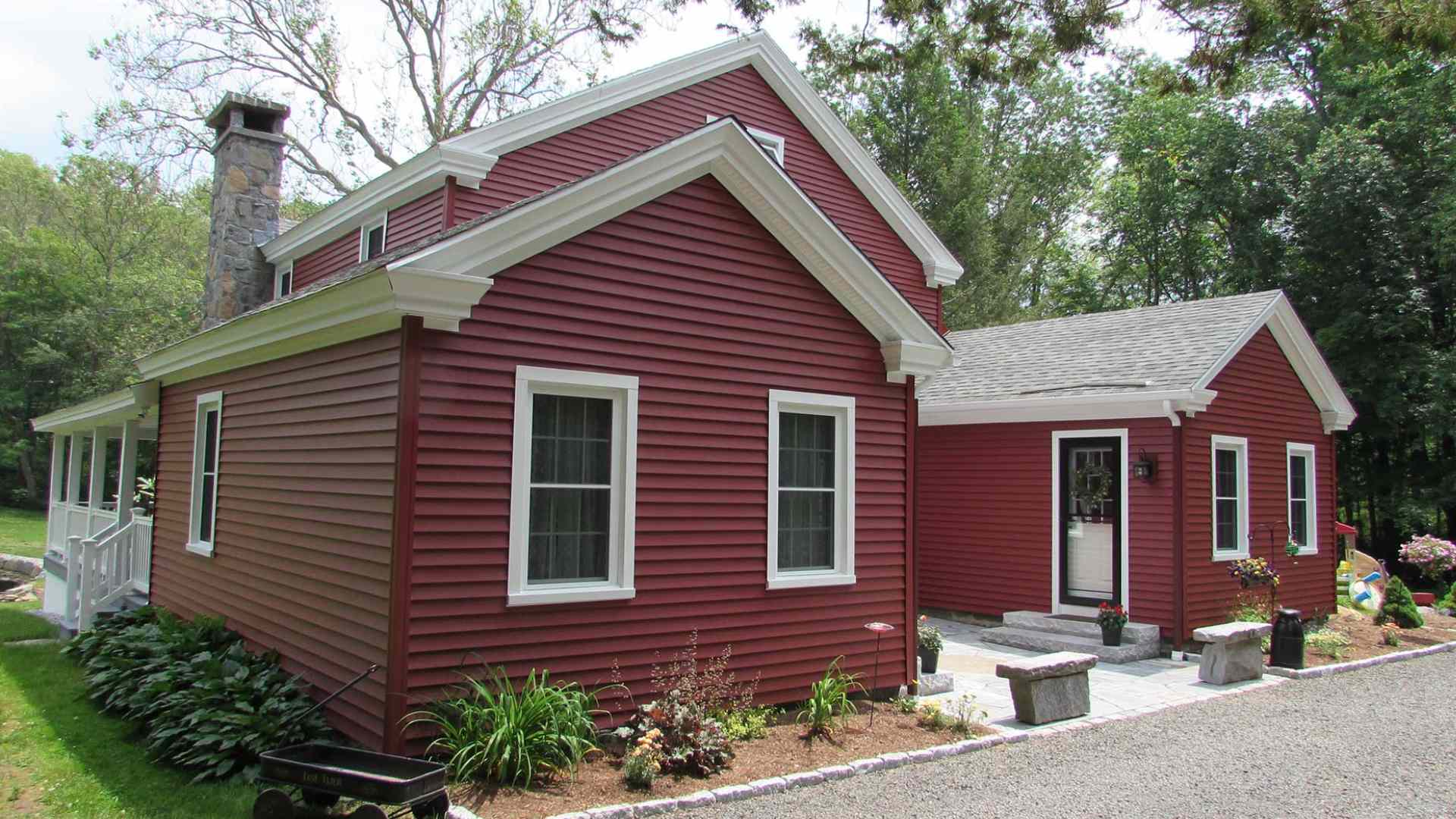 Siding service hero beautiful red and white house