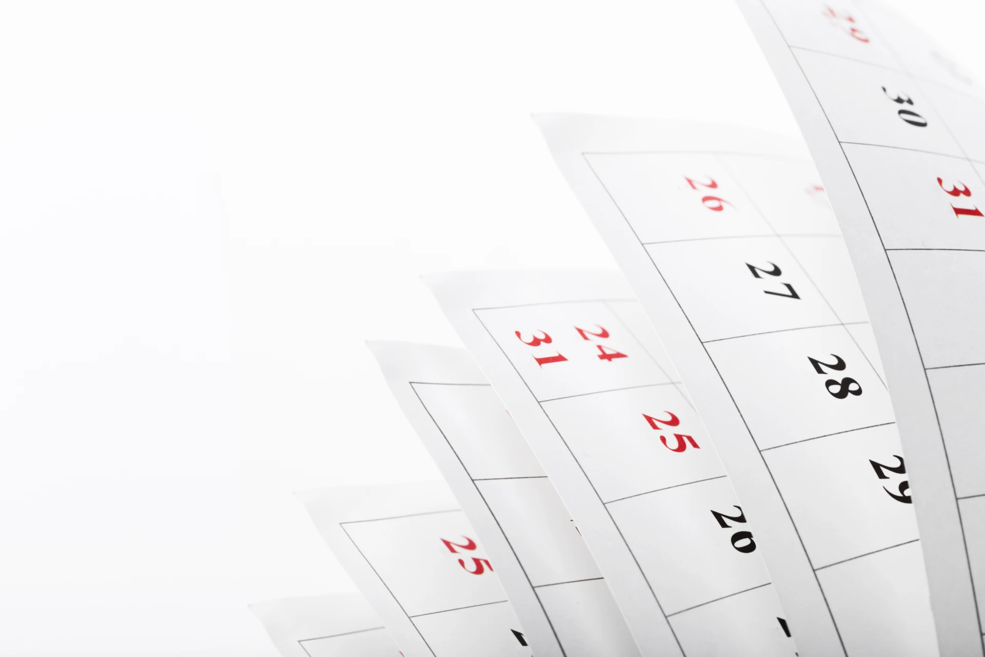 calendar pages flipping in a playful motion showing multiple dates and numbers photo 1
